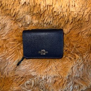 Navy blue pebbled Coach trifold wallet